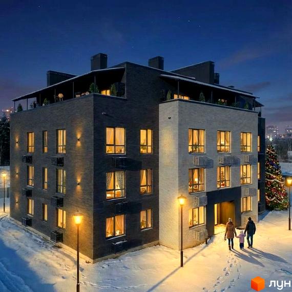 Житловий комплекс FAMILY PARK APARTMENS з освітленими вікнами та прибудинковою територією, засніженою та прикрашеною ялинкою.