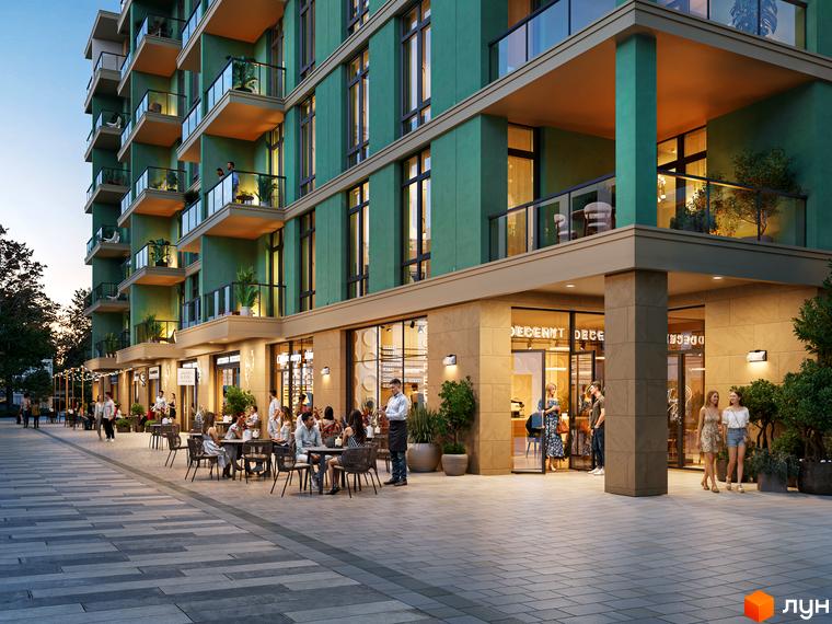 Зображення Житлового комплексу 44 Avenue: багатоповерховий будинок із зеленими фасадами та балконами, а також комерційні приміщення на першому поверсі з літніми терасами.