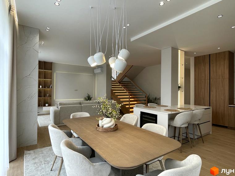 Сучасний інтер'єр будинку в житловому комплексі КМ Нова Ходосівка з обіднім столом та зоною відпочинку.