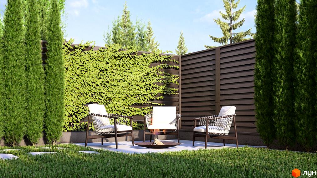 Сучасний двір житлового комплексу Таунхауси Svoie Birky з зеленими насадженнями та комфортними меблями для відпочинку.