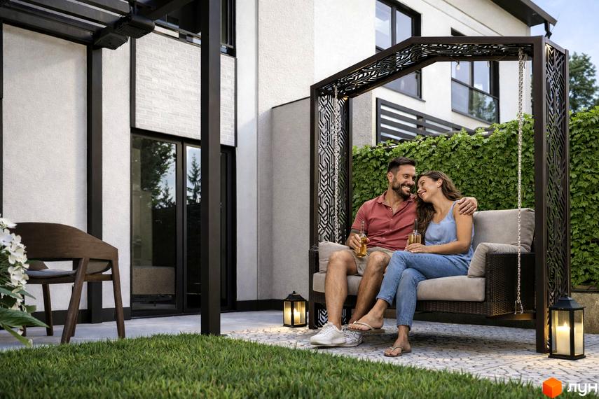 Житловий комплекс Таунхауси Svoie Birky з сучасним фасадом, прибудинкова територія з газоном та зоною відпочинку.