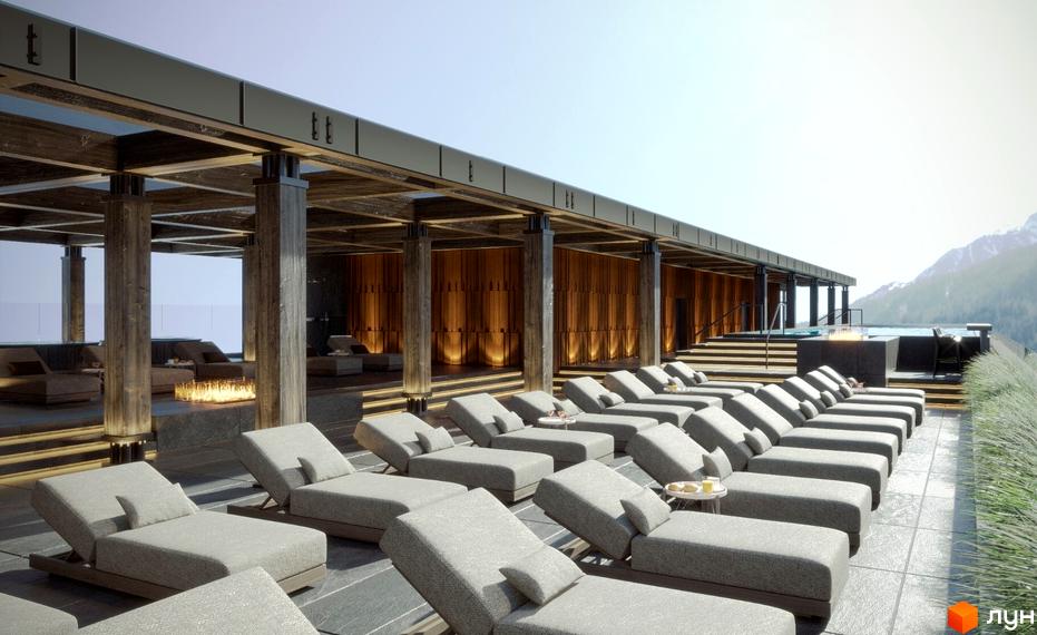 Зовнішній вигляд GRAND SPA RESORT AND CONFERENCE з зоною для відпочинку та шезлонгами на терасі.