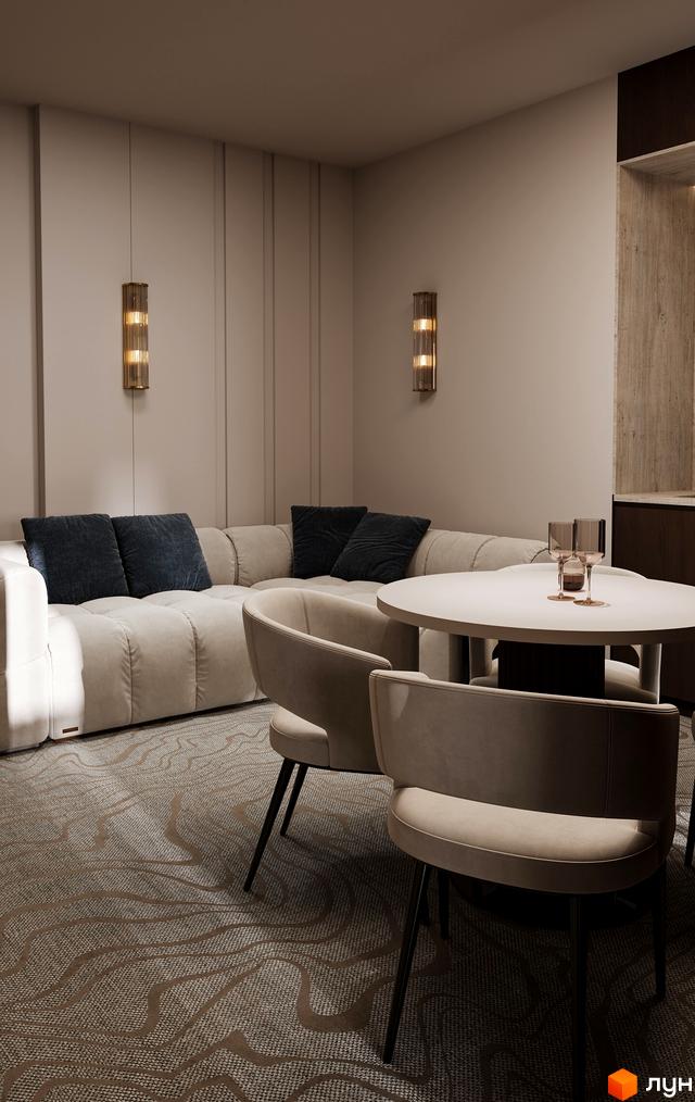 Інтер'єр вітальні з диваном та круглим столом у GRAND SPA RESORT AND CONFERENCE. Затишна зона відпочинку з м'якими меблями та елегантним освітленням.