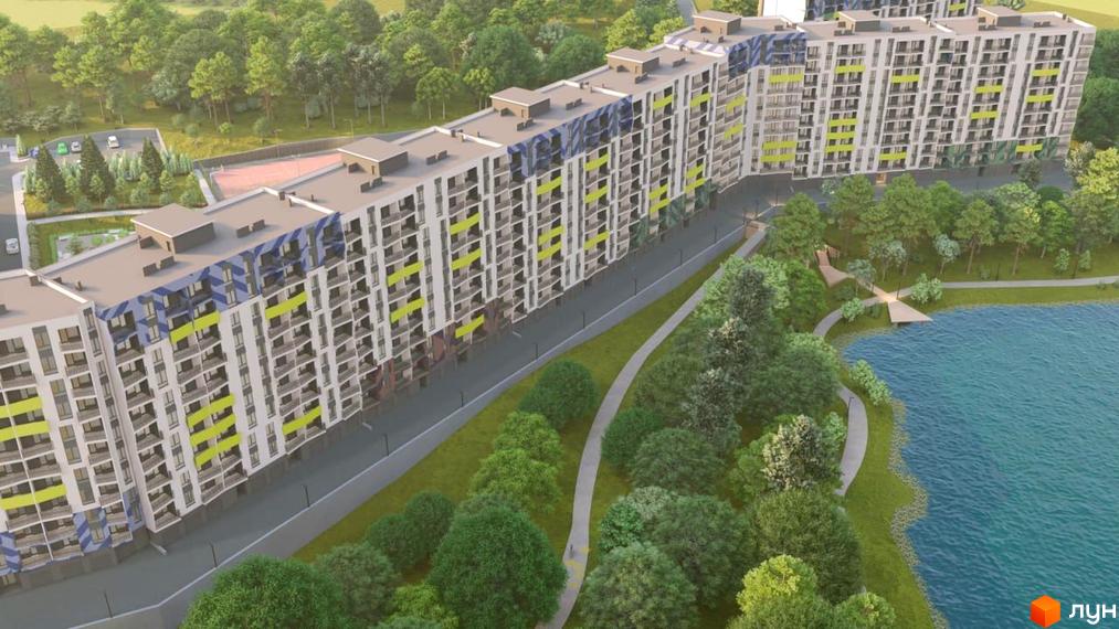 Житловий комплекс Мадагаскар з сучасною архітектурою, оточений зеленими насадженнями та прибудинковою територією біля водойми.