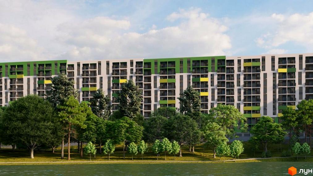 Житловий комплекс Мадагаскар з сучасним фасадом та зеленими балконами, оточений зеленими насадженнями та деревами.