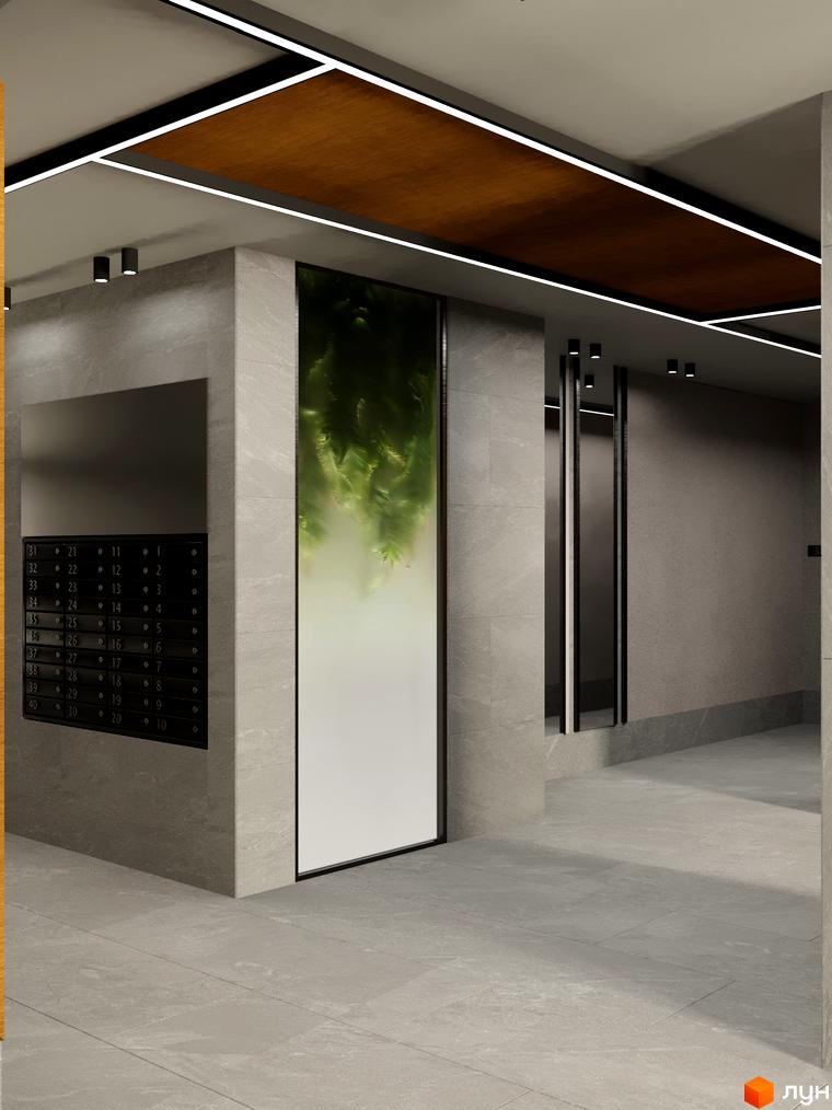 Житловий комплекс Eden Park: сучасний вхід з поштовими скриньками та декоративним панно. Просторий хол з сірою плиткою та елегантним освітленням.