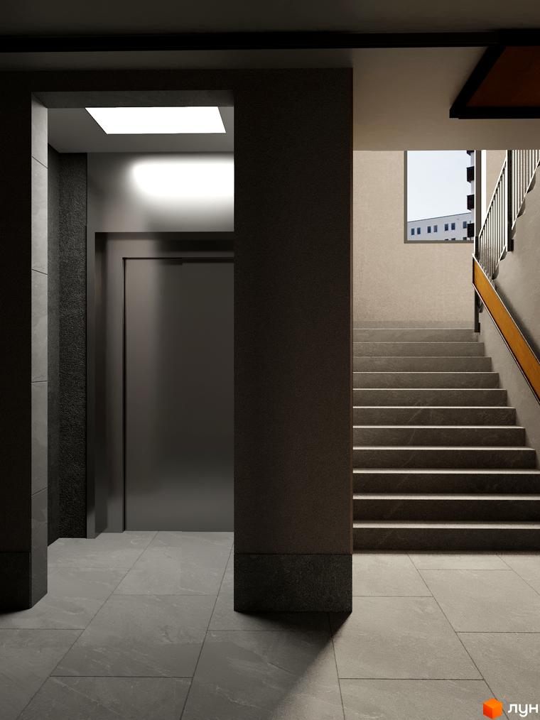 Вхідна група житлового комплексу Eden Park з дверима ліфта та сходами, що ведуть на верхні поверхи. Зовнішній вигляд новобудови.