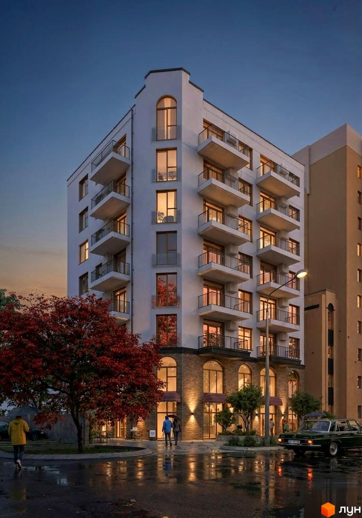 Житловий комплекс Lumen: багатоповерховий будинок з білим фасадом, балконами та цегляним цоколем. На вулиці мокрий асфальт, червоне дерево та вуличне освітлення.