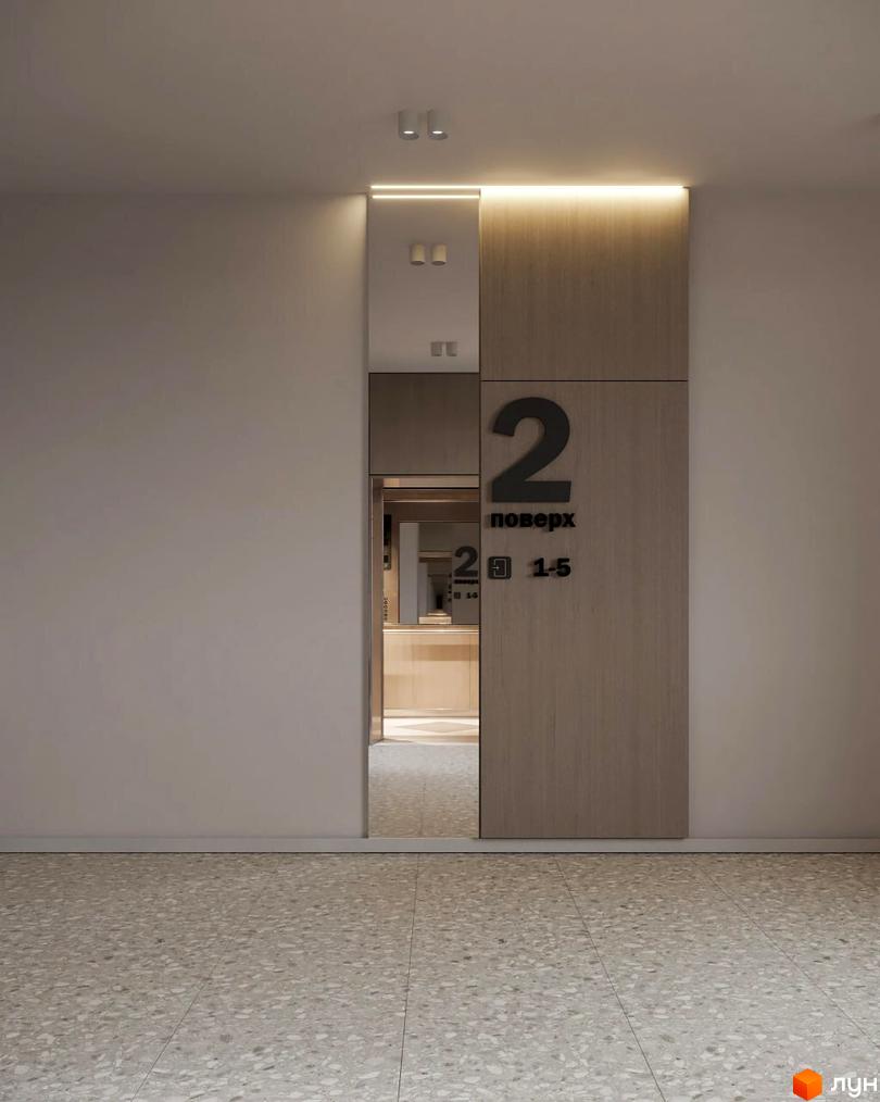 Інтер'єр холу Житлового комплексу Lumen з дерев'яною панеллю, що вказує на 