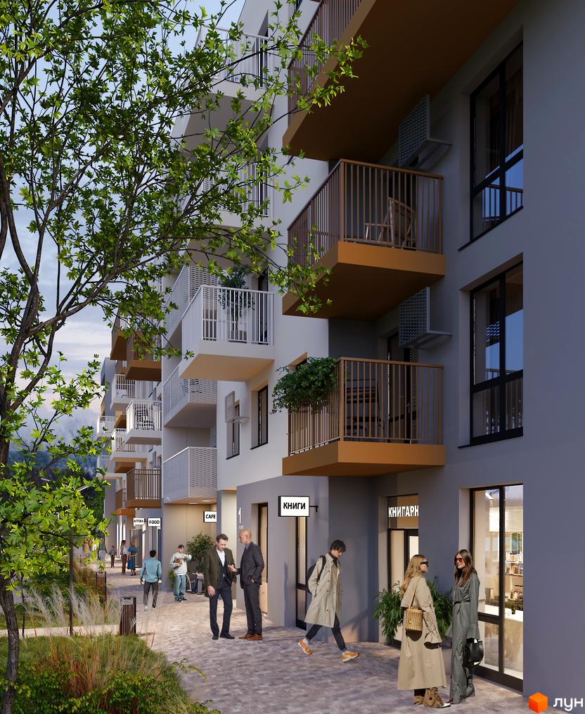 Фасад Житлового комплексу Під сонцем з балконами різних кольорів та великими вікнами. На першому поверсі комерційні приміщення, а поруч доріжка з деревами та людьми.