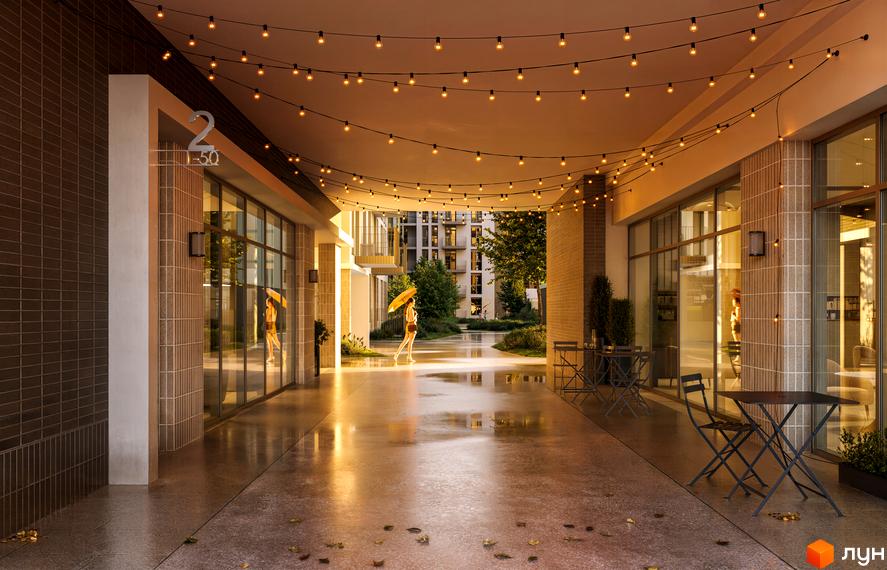 Житловий комплекс Avalon Yard з підсвіченим проходом та зеленим подвір'ям. Зовнішній вигляд новобудови та прибудинкової території.