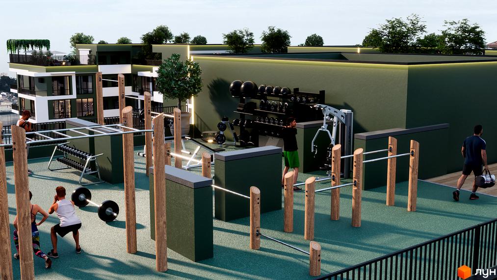 Житловий комплекс Green Side з зеленою зоною відпочинку та спортивним майданчиком. Сучасна архітектура будівлі та облаштована територія для тренувань.