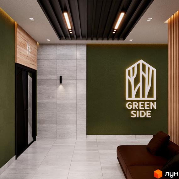 Інтер'єр лобі житлового комплексу Green Side з диваном та логотипом проєкту. Сучасний дизайн з акцентом на зелені кольори та натуральні матеріали.