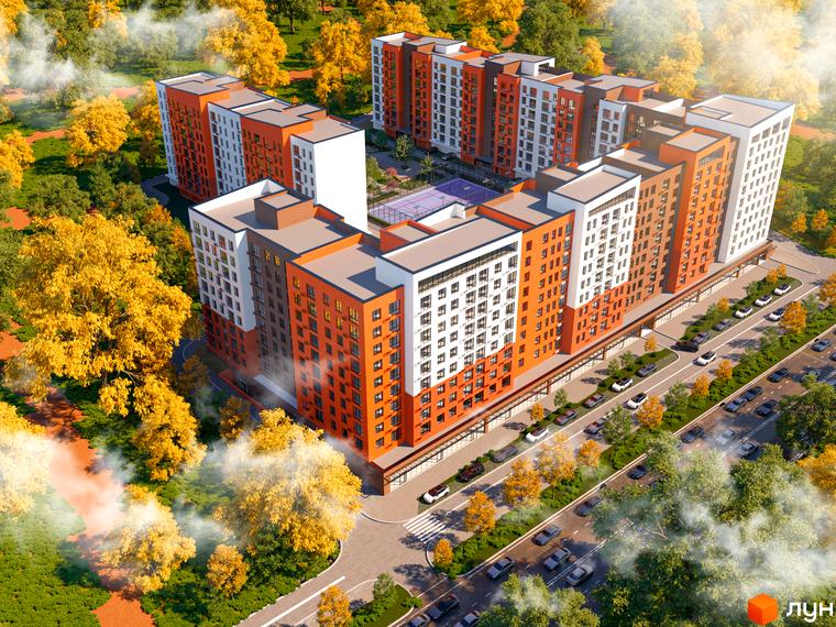 Новобудова ЖК Перлина Проскурова-5 з оранжево-білими фасадами та прибудинковою територією з деревами восени. Вид згори на будівлі та дорогу з автомобілями.