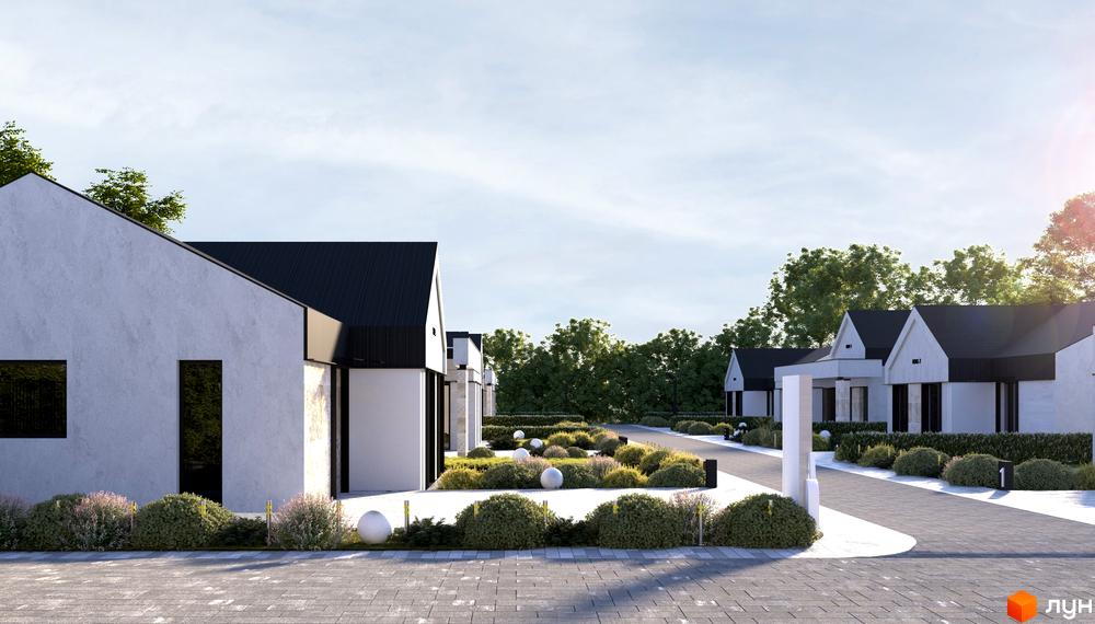 Котеджне містечко KOLO 32: ряд білих будинків з темними дахами та доглянутою прибудинковою територією з зеленими насадженнями.