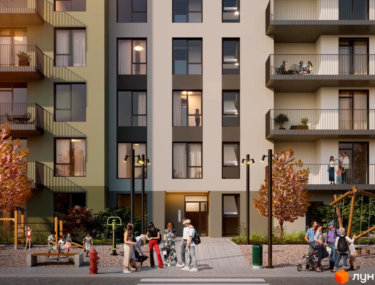 Фасад Житлового комплексу Героїв Крут 2 з балконами та вікнами. Прибудинкова територія облаштована дитячим майданчиком та зеленими насадженнями.