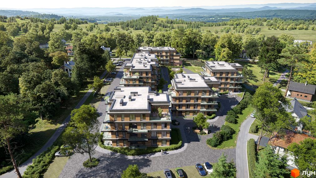 Житловий комплекс AURA з багатоповерховими будинками та балконами, оточений зеленими насадженнями та парковками. Вид зверху на забудову серед пагорбів.