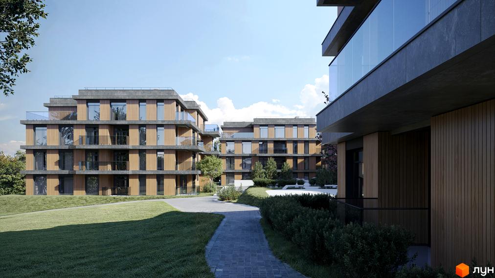 Житловий комплекс AURA з багатоповерховими будинками, оздобленими дерев'яними панелями та скляними балконами. Навколо будівель розташовані зелені газони, доріжки з бруківки та доглянуті кущі.