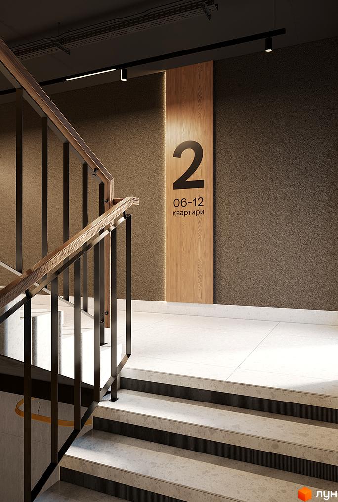 Вхідна група житлового комплексу AURA з мармуровими сходами та дерев'яним декором. Сучасний дизайн інтер'єру сходової клітки.