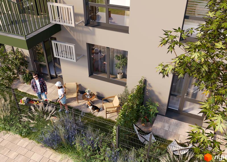 Фасад Житлового комплексу Субурбія Соло світлого кольору з балконами. На прибудинковій терасі зона барбекю, меблі та зелені насадження.