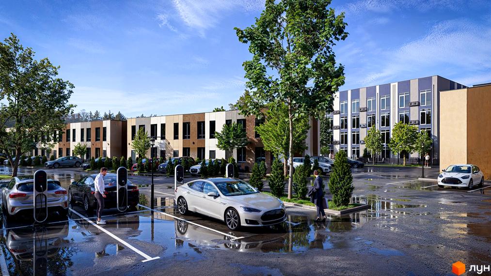 Таунхауси Емірати - новобудова з паркінгом та зарядними станціями для електромобілів. Сучасна архітектура будівель та доглянута прибудинкова територія.