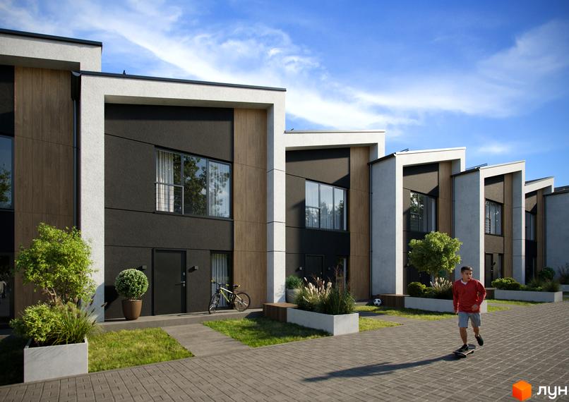 Сучасні таунхауси з дерев'яними та чорними фасадами, прибудинкова територія з газоном та дитиною на скейтборді. Вул. Вітавська, 32.