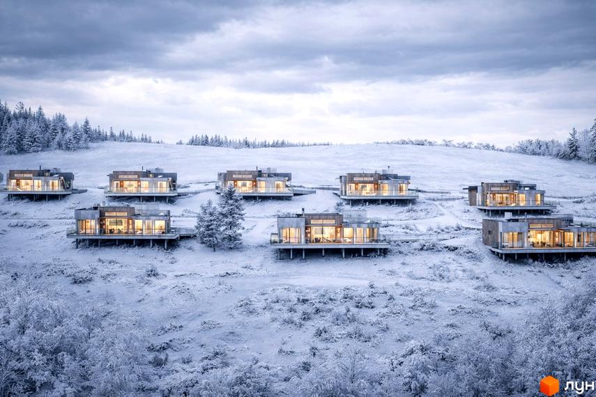 Котеджний комплекс MÓNTES invest & resort: окремі будинки з панорамними вікнами, розташовані на засніженому схилі серед дерев.