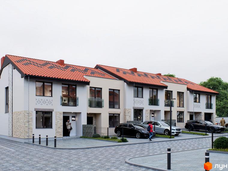 Зовнішній вигляд котеджного містечка КМ Етнія з червоним черепичним дахом та прибудинковою територією з автомобілями та бруківкою.