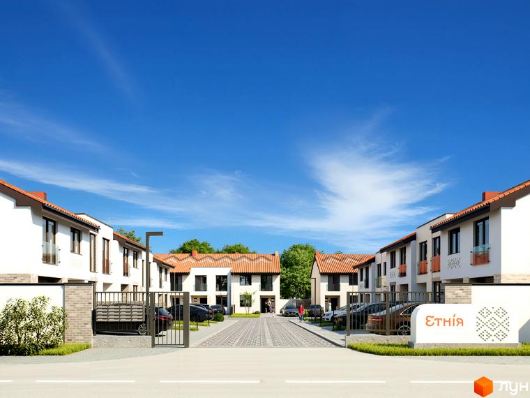 Котеджне містечко Етнія: білі будинки з червоними дахами та доглянута прибудинкова територія з парковкою.