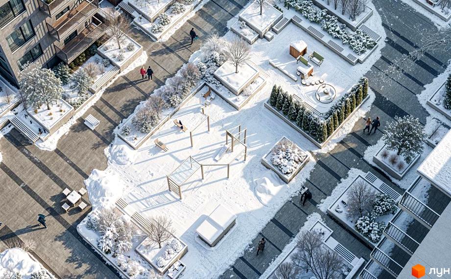 Багатоповерховий будинок Житлового комплексу Park Residence з балконами та засніжена прибудинкова територія з доріжками, деревами, дитячим майданчиком.