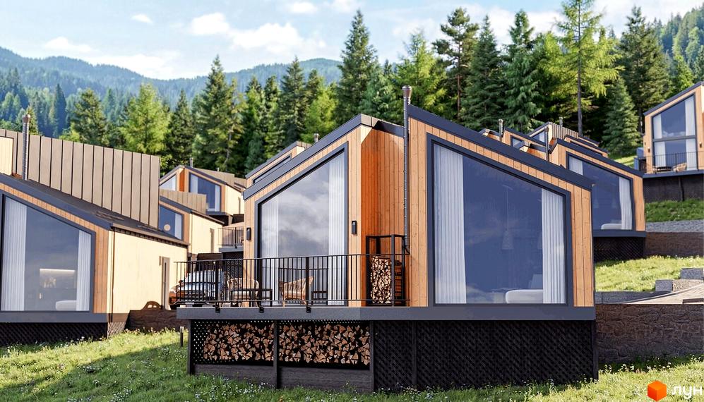 Котеджне містечко КМ Теплий: дерев'яні будинки з великими вікнами на фоні гір та лісу. Територія комплексу вкрита зеленою травою.