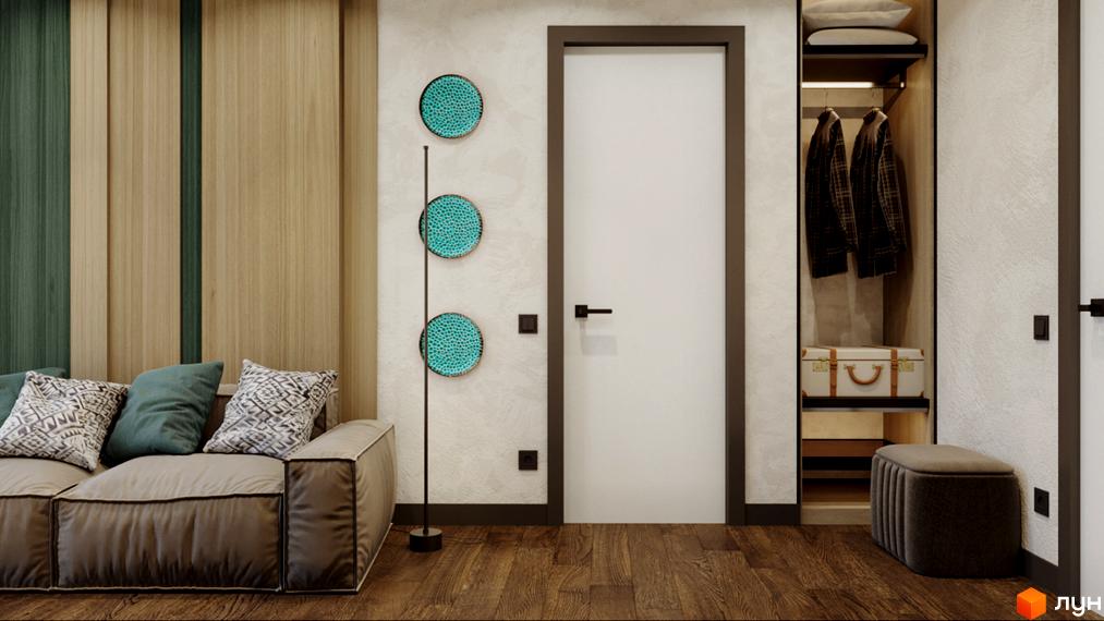 Інтер'єр апарт-готелю Rich Stone Family Club з диваном, шафою та дверима. Дизайн кімнати у світлих тонах з дерев'яними елементами.