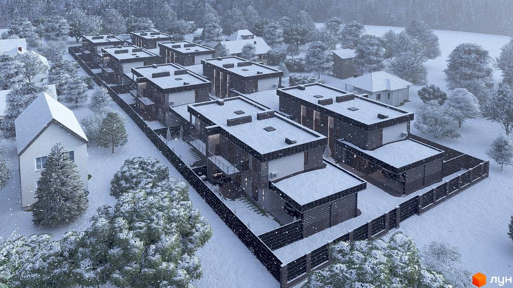 Житловий комплекс на вул. Сонячна, 43: будинки з темними фасадами та пласкими дахами серед засніжених дерев у зимовий день.