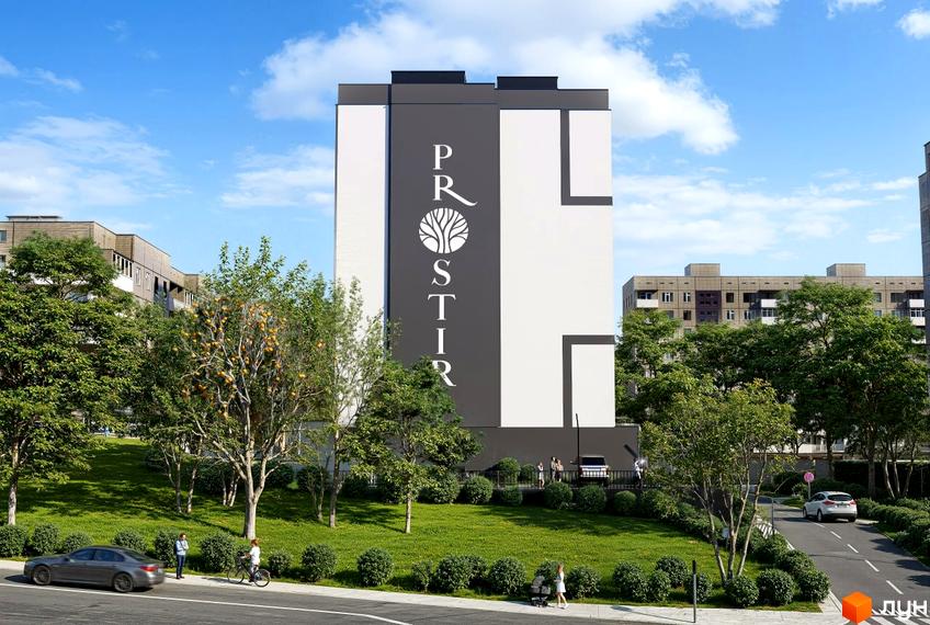 Житловий комплекс Prostir комфорту: багатоповерховий будинок з білими та темно-сірими фасадами, оточений зеленими насадженнями та дорогою.