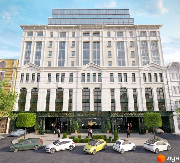 Зображення фасаду будівлі ЖК Вісімнадцята перлина. Просторий вхід з великими вікнами, зелені насадження та припарковані автомобілі перед будівлею.