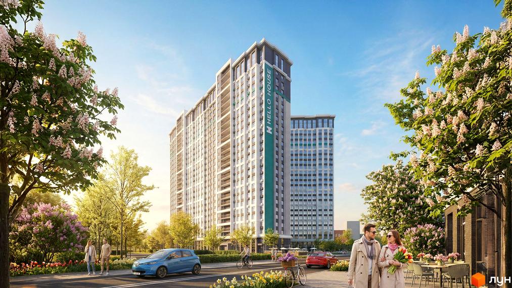 Житловий комплекс Hello House з високими фасадами та балконами, оточений квітучими деревами та зеленою зоною. На вулиці біля будинку розташовані автомобілі та люди.
