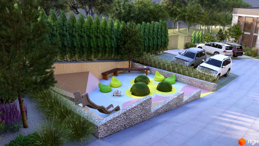 Котеджне містечко KM Yalo Village. Дитячий майданчик з гіркою, зеленими пуфами та елементами для ігор, оточений кам'яним парканом. На задньому плані - парковка з автомобілями та зелені насадження.