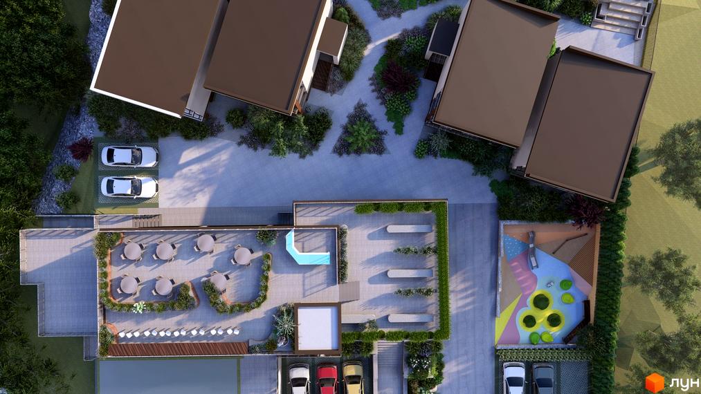 Котеджне містечко K.M. Yalo Village з сучасними будинками та доглянутою прибудинковою територією, що включає зони відпочинку та дитячий майданчик.