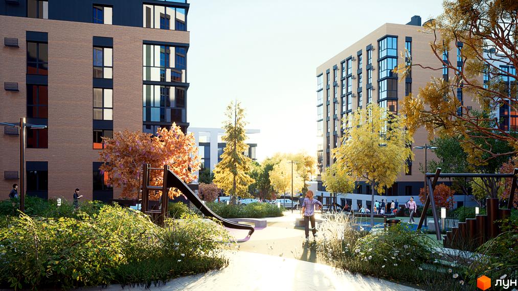Житловий комплекс PERFECT City: багатоповерхові будинки цегляного та світлого кольору, розташовані навколо зеленого двору з дитячим майданчиком та осінніми деревами.