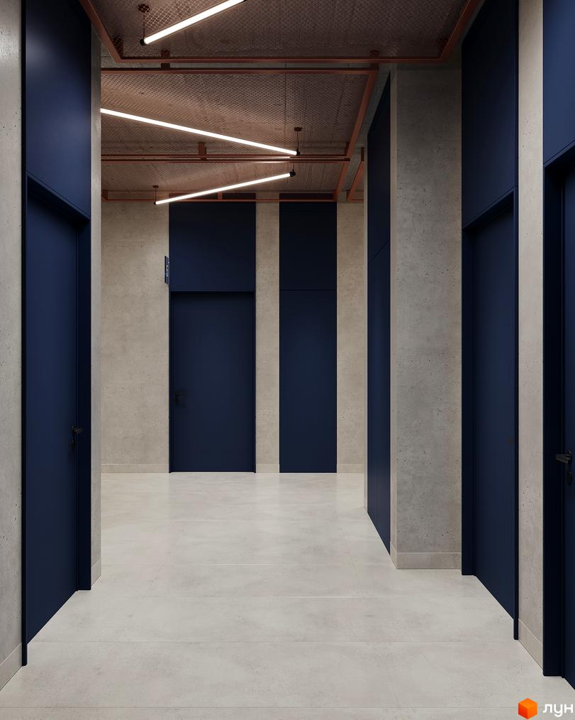 Інтер'єр коридору Житлового комплексу AUROOM DISTRICT з бетонними стінами, темно-синіми дверима, стелею з металевою сіткою та лінійним освітленням.
