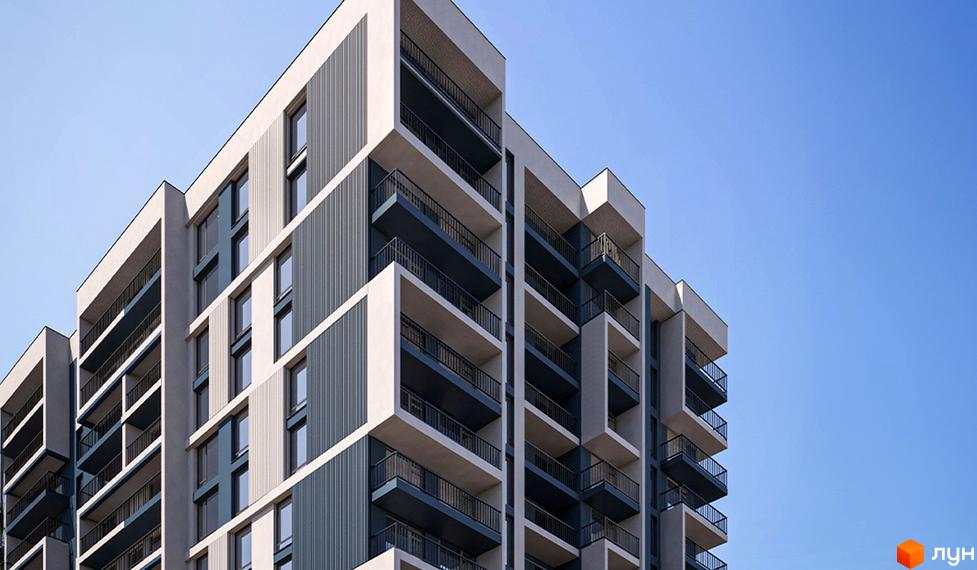 Новобудова Comfort Park 2 з балконами та панорамними вікнами на тлі блакитного неба. Зовнішній вигляд будинку з сірими та білими фасадами.