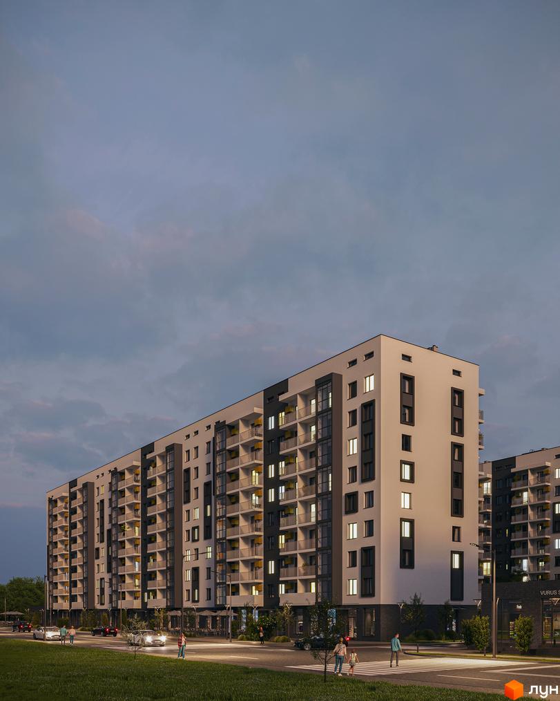 Зовнішній вигляд житлового комплексу Авантаж 247 з балконами та вікнами, що виходять на вулицю з автомобілями та пішоходами.