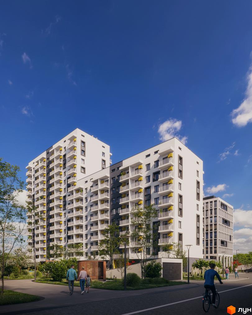 Новобудова Авантаж 247 з білими фасадами та жовтими акцентами на балконах. Навколо зелена прибудинкова територія з доріжками та деревами.