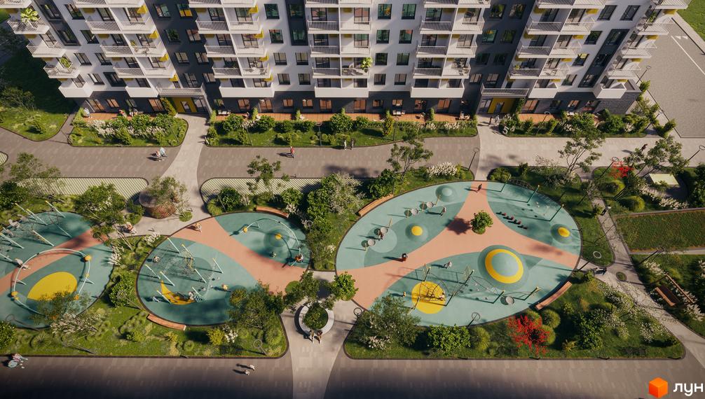Житловий комплекс Авантаж 247 з багатоповерховими будинками та облаштованим дитячим майданчиком.