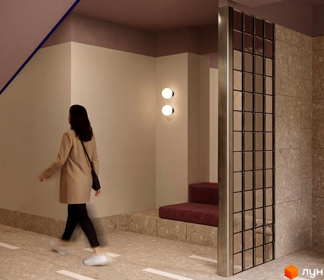 Житловий комплекс SOFIhome: сучасний дизайн інтер'єру з двома круглими світильниками та оббивкою бордового кольору. Терасна підлога та стіни з кам'яною крихтою.