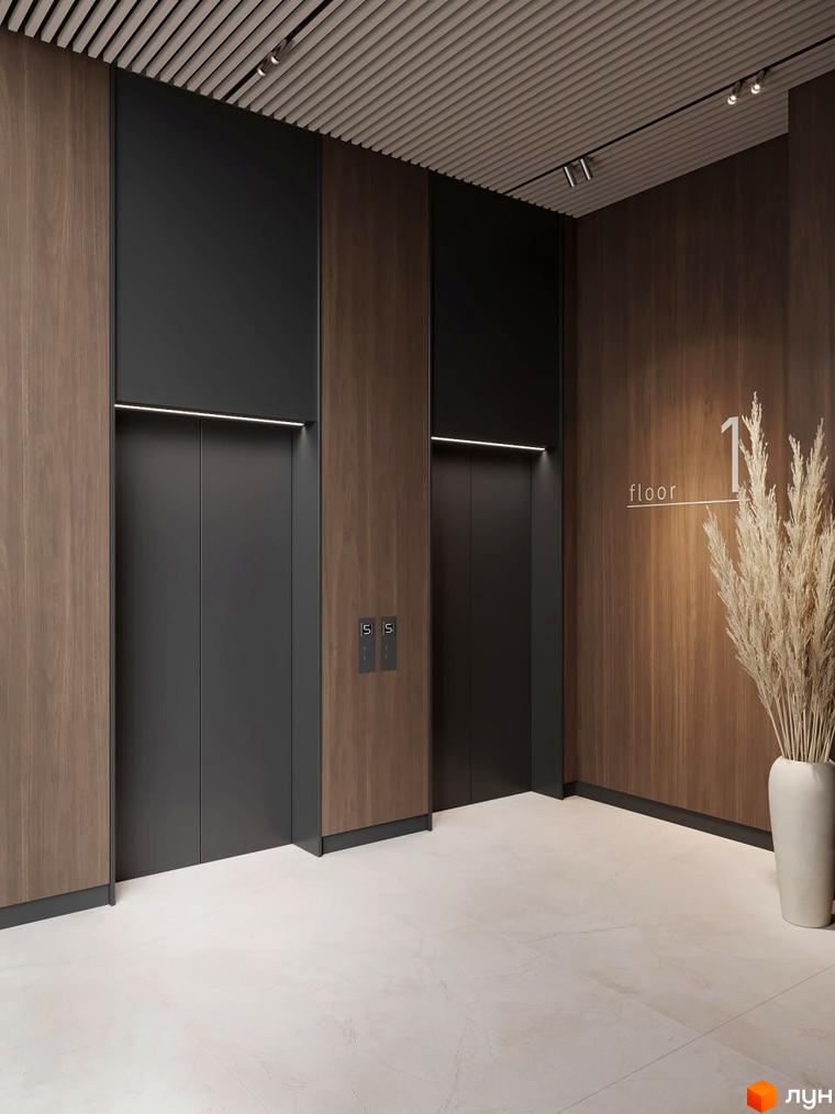 Апарт-комплекс Н1: елегантний хол з дерев'яними панелями та темними ліфтами. Сучасне освітлення та мінімалістичний дизайн створюють затишну атмосферу.