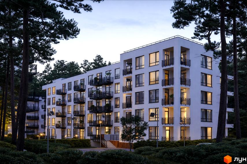 Новобудова ЖК Грінвуд-2 з балконами та великими вікнами, оточена деревами. Навколо будинку зелені насадження та освітлення.