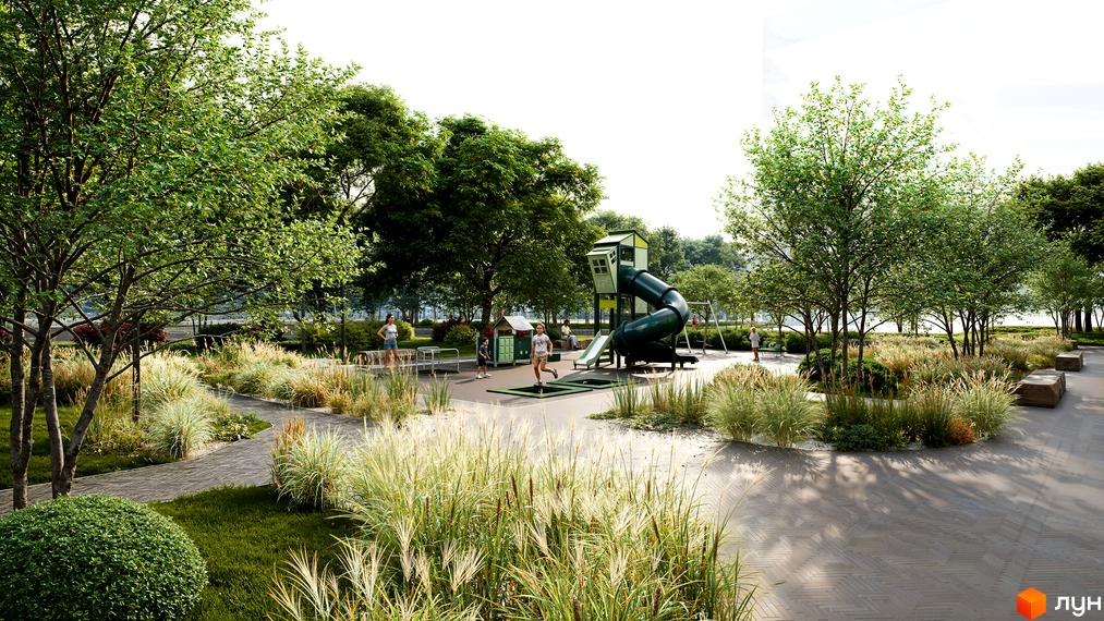 Дитячий майданчик з гіркою та гойдалками, оточений доглянутими зеленими насадженнями та пішохідними доріжками Житлового комплексу Молоді.