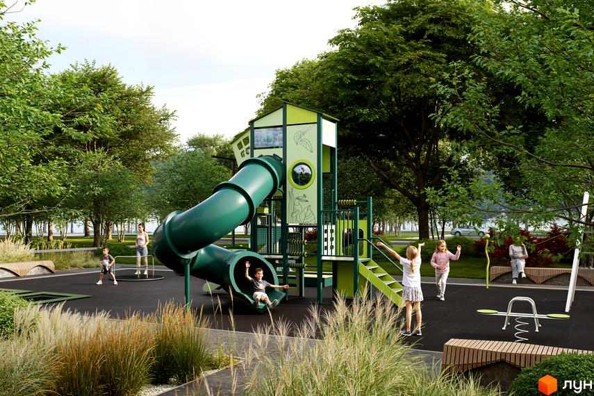 Дитячий майданчик Житлового комплексу Молоді з великою зеленою гіркою та ігровими елементами, оточений деревами та доглянутими газонами.