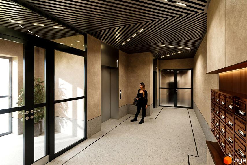 Просторий хол Житлового комплексу Молоді з ліфтом, поштовими скриньками та панорамними скляними дверима. Стеля оздоблена геометричним візерунком.
